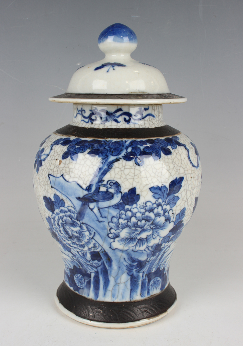 A Chinese blue and white crackle glazed porcelain jar and cover, late 19th/early 20th century, the