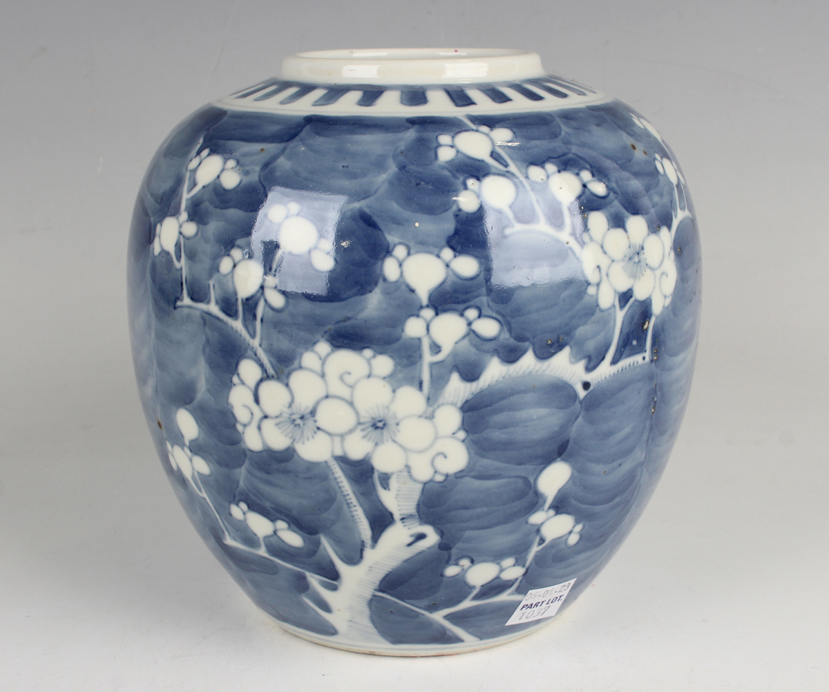 A Chinese blue and white porcelain 'phoenix tail' vase, late 19th century, painted with blossoming - Image 18 of 29