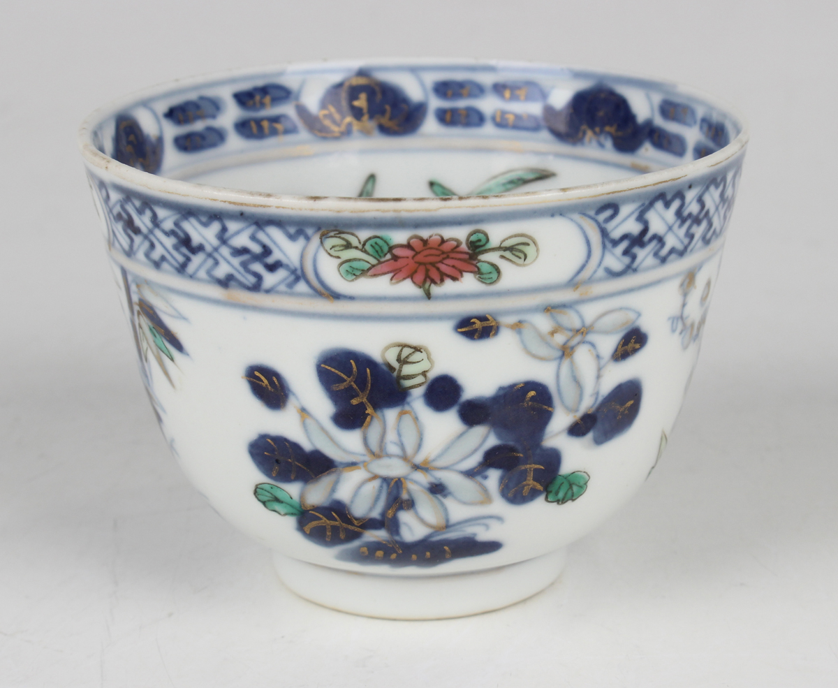 A Chinese underglaze blue and famille rose enamelled porcelain teabowl, mark of Kangxi but late 19th