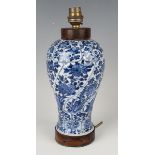 A Chinese blue and white porcelain vase, Kangxi period, the baluster body with spiral moulded and