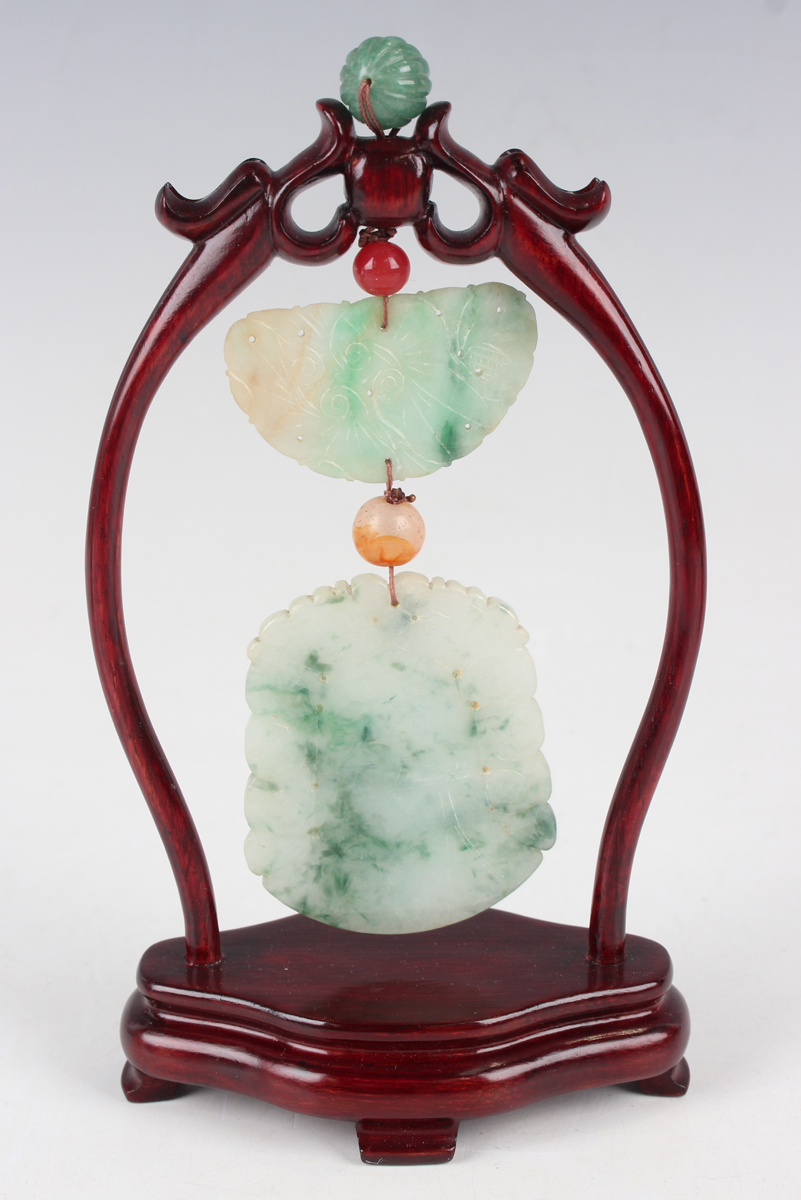 A Chinese jade pendant with wood stand, mid-20th century, the two-piece pendant with carved and - Image 20 of 22