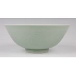 A Chinese celadon glazed porcelain bowl, mark of Qianlong but probably 20th century, of steep-