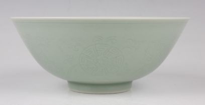 A Chinese celadon glazed porcelain bowl, mark of Qianlong but probably 20th century, of steep-