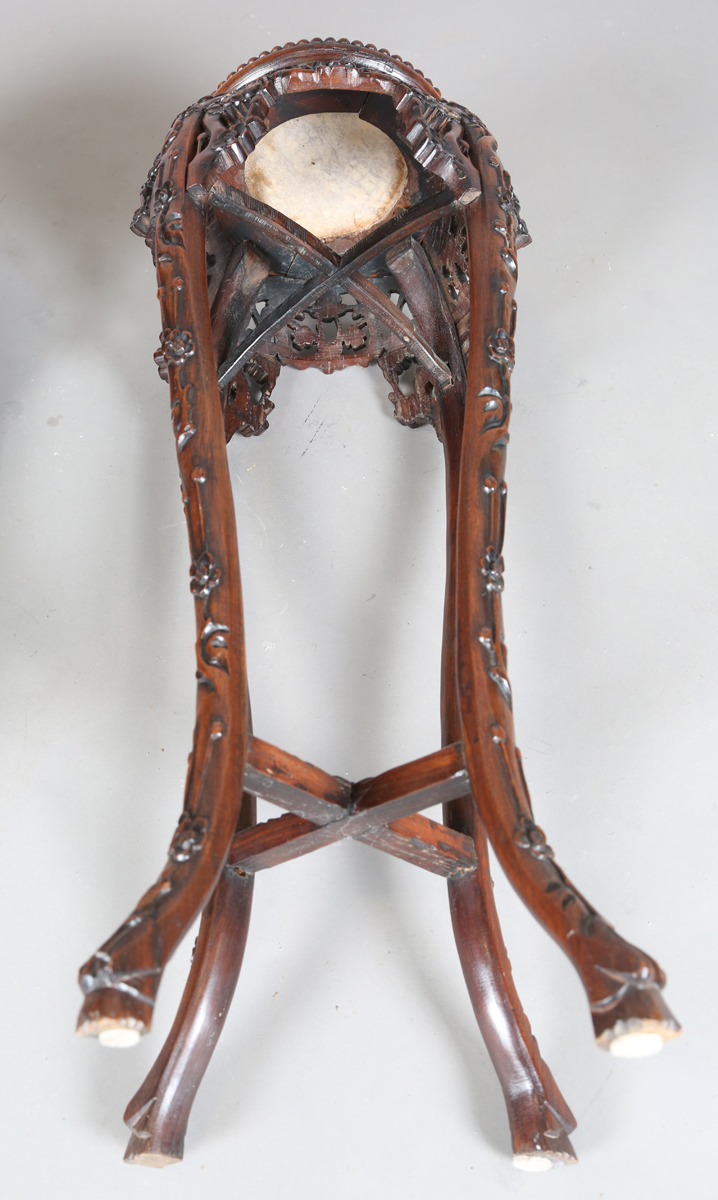 A pair of Chinese hardwood jardinière stands, late Qing dynasty, each circular top inset with a - Image 6 of 33