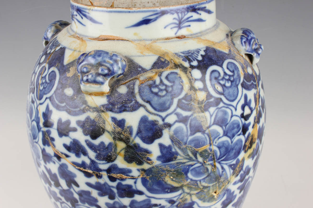 A Chinese blue and white porcelain vase, late 19th century, of baluster form, painted with flowers - Image 3 of 17