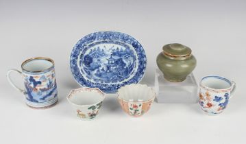A small group of Chinese pottery, including an Imari mug, Kangxi period, painted with a coastal