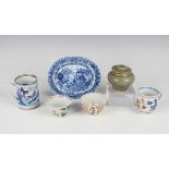 A small group of Chinese pottery, including an Imari mug, Kangxi period, painted with a coastal