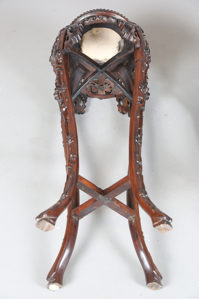 A pair of Chinese hardwood jardinière stands, late Qing dynasty, each circular top inset with a - Image 10 of 33