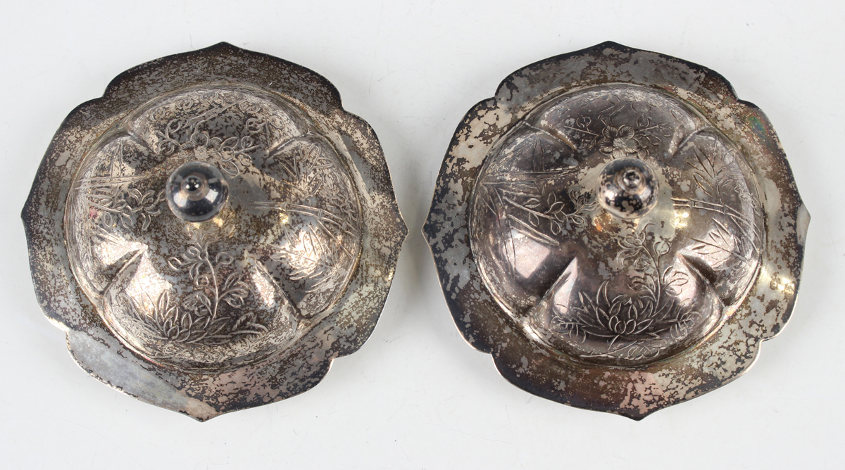 A pair of Chinese porcelain teabowls with silver covers and stands, mid-20th century, each bowl - Image 3 of 19