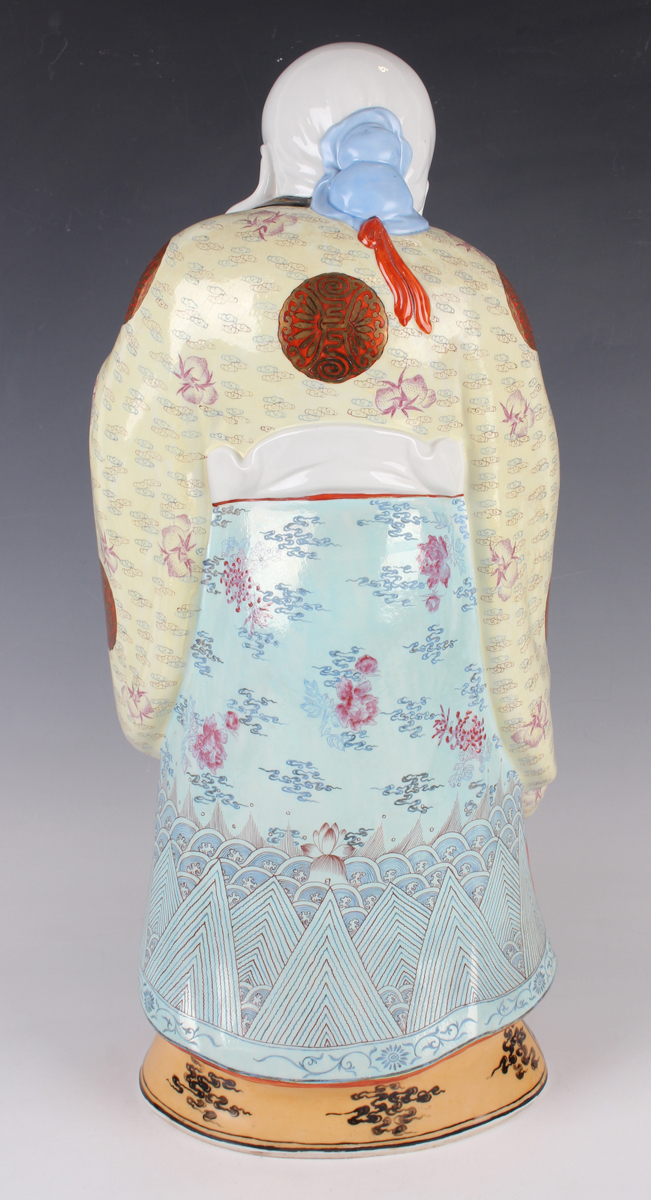 A Chinese famille rose porcelain figure of Shoulao, 20th century, modelled standing wearing a - Image 7 of 9