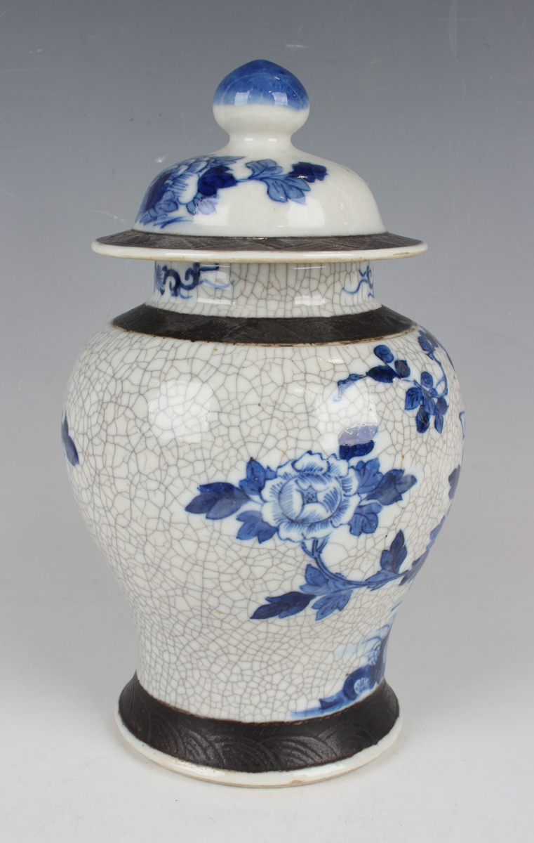 A Chinese blue and white crackle glazed porcelain jar and cover, late 19th/early 20th century, the - Image 7 of 9