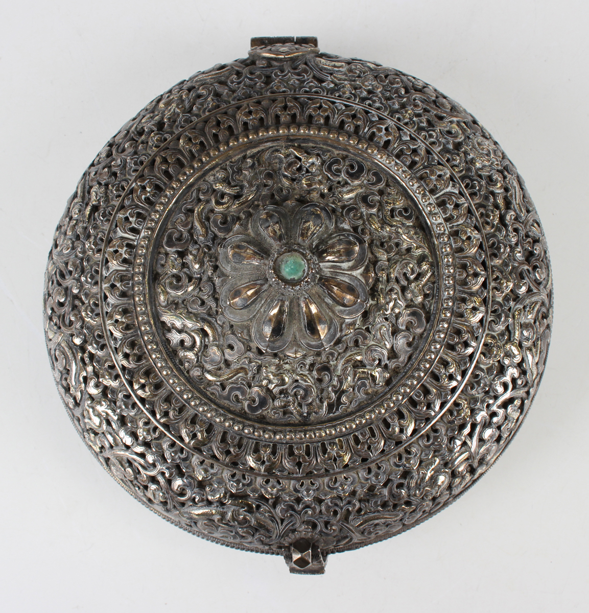 A South-east Asian white metal and parcel gilt circular box and cover, probably Tibetan or Chinese - Image 8 of 8