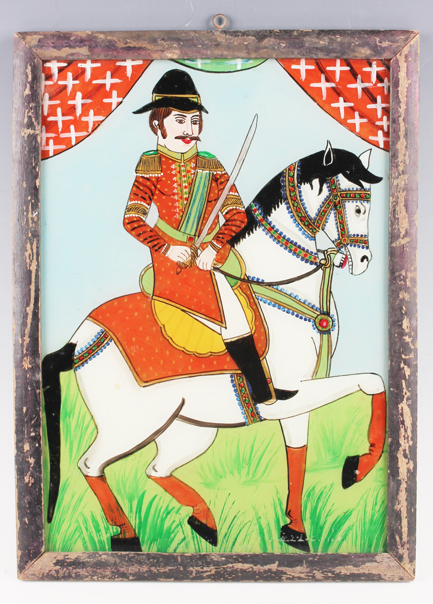 An Indian reverse painting on glass, late 19th/early 20th century, depicting a portrait of a general