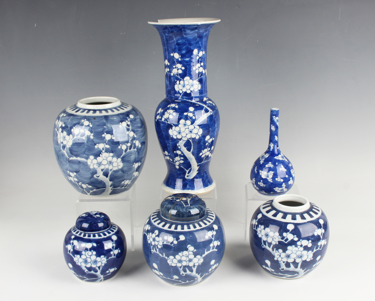 A Chinese blue and white porcelain 'phoenix tail' vase, late 19th century, painted with blossoming