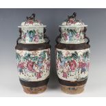 A pair of Chinese famille rose crackle glazed porcelain vases and covers, late 19th century, each