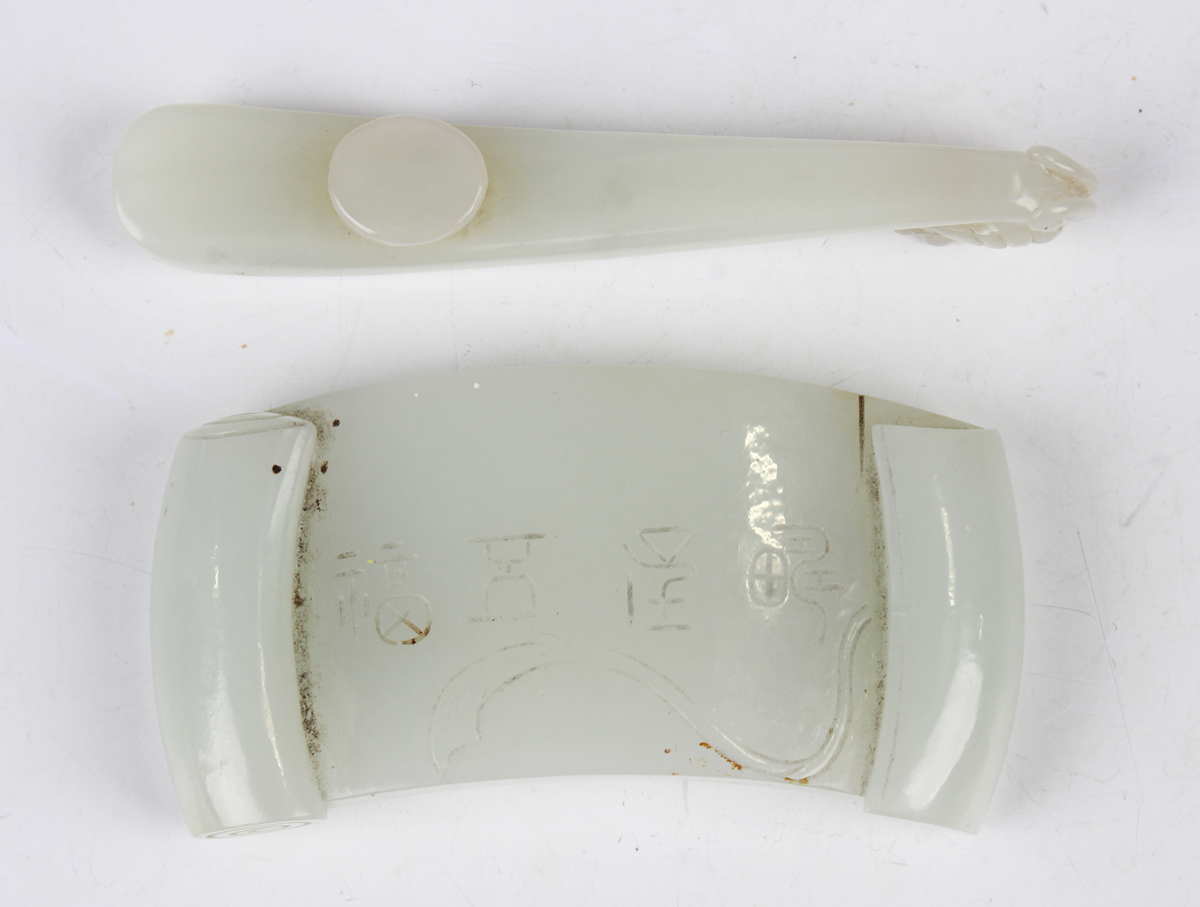 A Chinese pale celadon jade belthook and buckle, probably 20th century, the belthook of typical