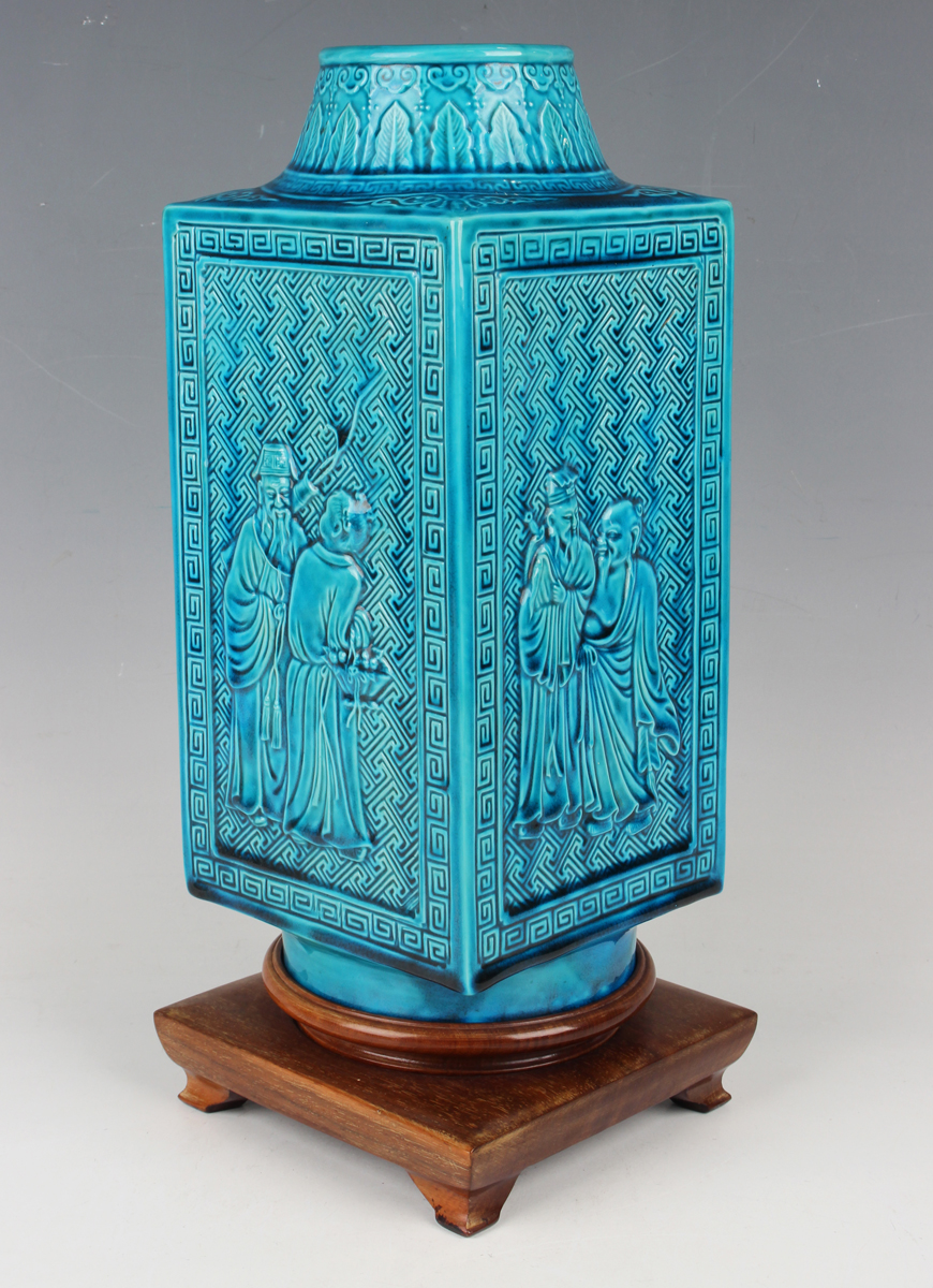A Chinese turquoise glazed porcelain cong vase, late 19th century, each side moulded in relief