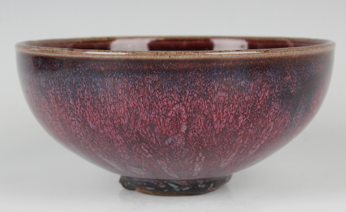 A Chinese flambé glazed porcelain bowl, Qing dynasty, the rounded sides rising to an everted rim - Image 6 of 18
