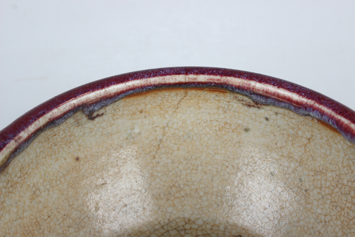 A Chinese flambé glazed porcelain bowl, Qing dynasty, the rounded sides rising to an everted rim - Image 12 of 18