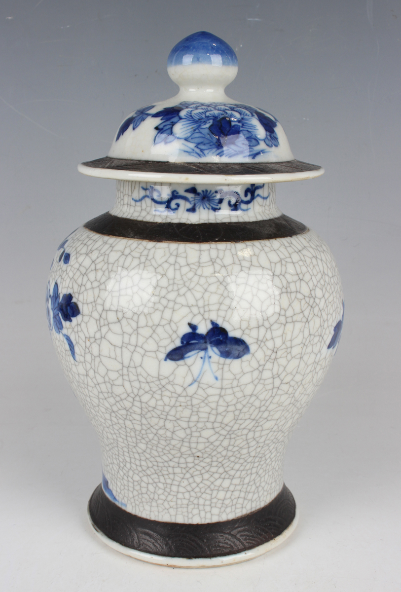 A Chinese blue and white crackle glazed porcelain jar and cover, late 19th/early 20th century, the - Image 8 of 9