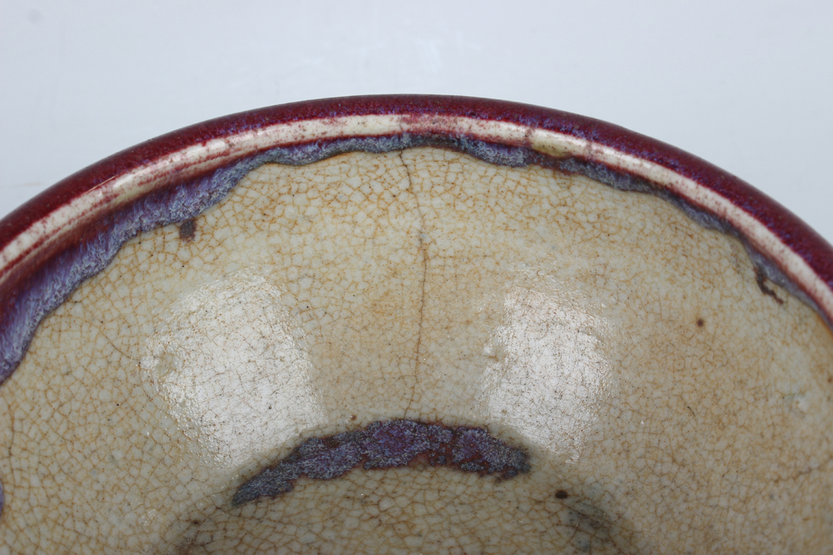 A Chinese flambé glazed porcelain bowl, Qing dynasty, the rounded sides rising to an everted rim - Image 13 of 18