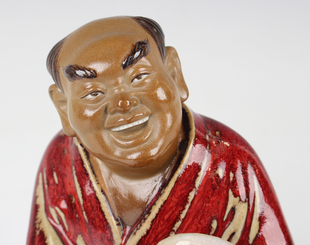 A Chinese Shiwan pottery sang-de-boeuf glazed figure of Guan Yu, modelled in a seated pose, - Image 7 of 22