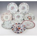 A set of three Chinese famille rose export porcelain plates, late Qianlong period, each painted with