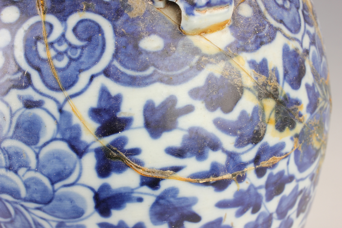 A Chinese blue and white porcelain vase, late 19th century, of baluster form, painted with flowers - Image 4 of 17