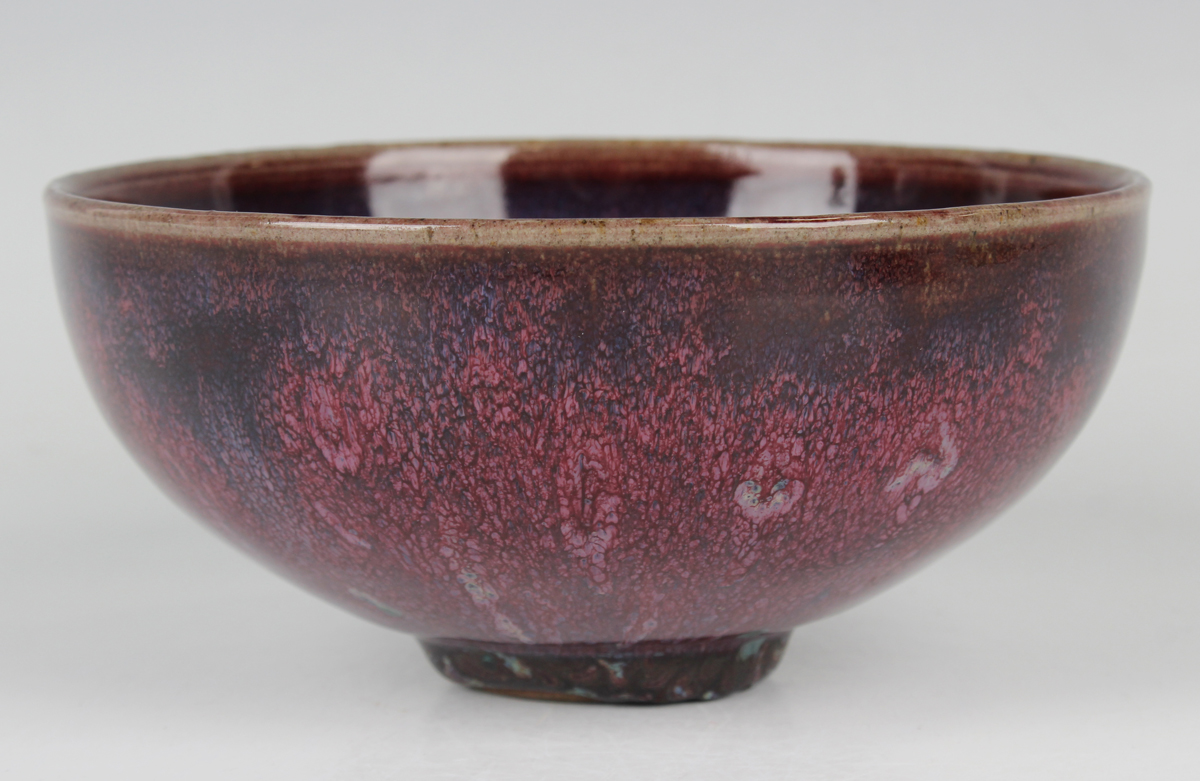 A Chinese flambé glazed porcelain bowl, Qing dynasty, the rounded sides rising to an everted rim - Image 5 of 18