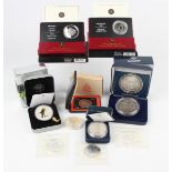 A small collection of Canadian and Australian mint commemorative coins, including two Royal Canadian