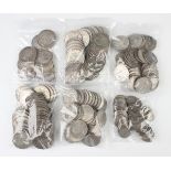 A large collection of pre-1947 British silver coinage, including half-crowns, florins, shillings,