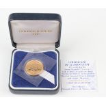 An Elizabeth II Brilliant Uncirculated sovereign 2002, cased with certificate.Buyer’s Premium 29.