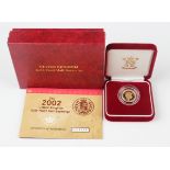 An Elizabeth II Royal Mint proof half-sovereign 2002, cased with certificate, No. 04554.Buyer’s