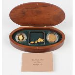 A Perth Mint gold 100 Year Heritage set, comprising a Victoria Old Head sovereign 1899, an Elizabeth