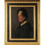 An early 20th century painted and gilt composition cassetta frame of wide section with raked knull