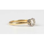 An 18ct gold and diamond single stone ring, mounted with a circular cut diamond, weight 2.5g,