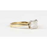 An 18ct gold and diamond single stone ring, claw set with a square cut diamond, Birmingham 1998,