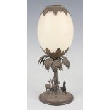 A late 19th century New Zealand silver mounted egg cup by B. Petersen & Co, the cream coloured