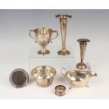 A small group of silver, including a two-handled trophy cup, Birmingham 1925, height 10.5cm, a