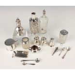 A group of silver, including a perfume bottle sleeve with pierced and embossed decoration,