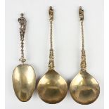 A pair of 19th century Dutch silver gilt apostle spoons, each with figural finial and twist stem,
