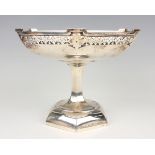A George V silver footed bowl, the hexagonal top pierced with a band for fleur-de-lis and floral