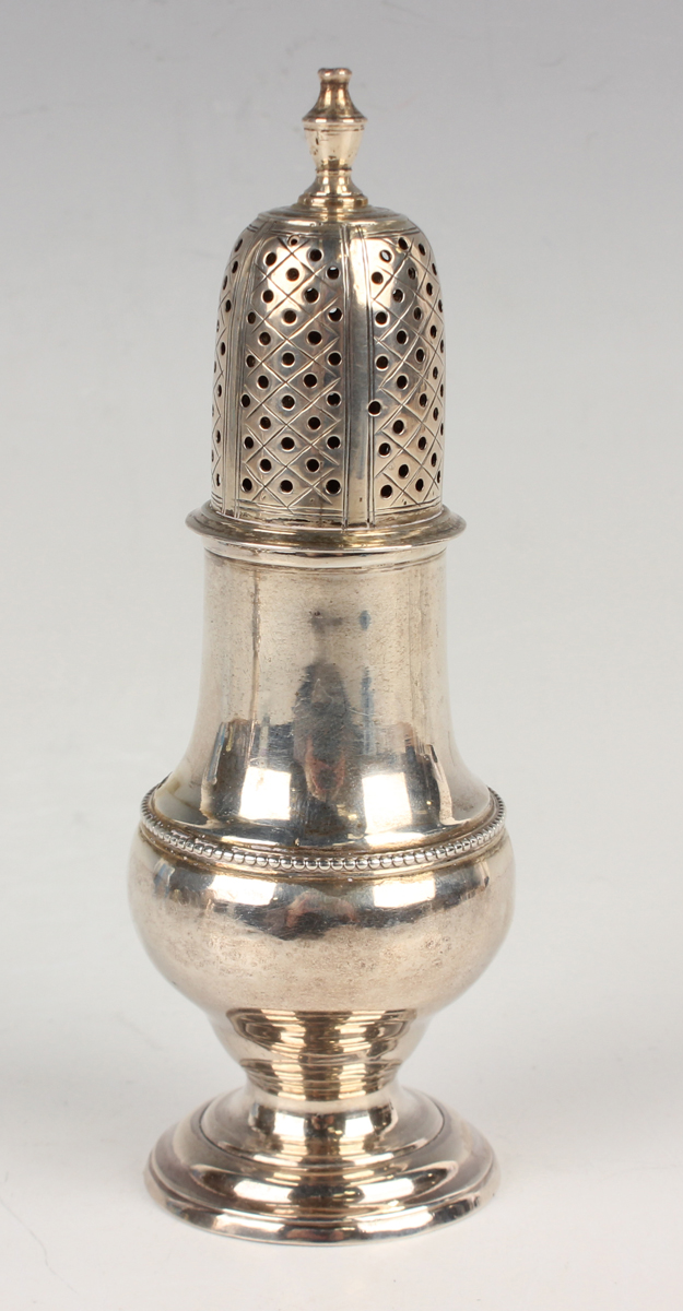 A George II silver caster of girdled low-bellied form, the pierced domed cover with pierced grille - Image 3 of 5