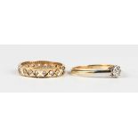 A gold and diamond single stone ring, claw set with a circular cut diamond, unmarked, weight 1.9g,