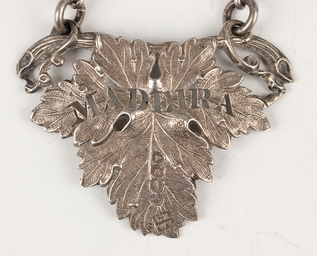 A William IV silver decanter label in the form of a vine leaf pierced with 'Madeira', London 1836, - Image 4 of 4