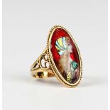 A French gold and Limoges enamelled oval ring, early 20th century, designed as a portrait of a