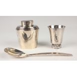 An Elizabeth II silver shot cup of hammered tapering cylindrical form on a wavy circular foot,