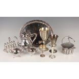 A collection of plated items, including a three-piece coffee set and tray, a muffin dish, cover