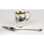 A George III silver christening tankard of half-reeded form with foliate handle, London 1817, weight