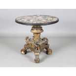 A 19th century Continental giltwood table base with a specimen marble circular top, the triform base